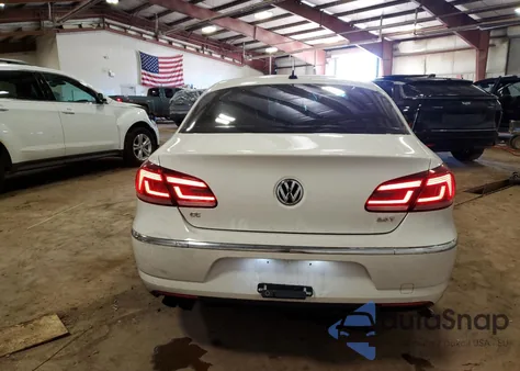 2013 Volkswagen Cc Sport from USA, damaged, VIN WVWBN7AN9DE557768